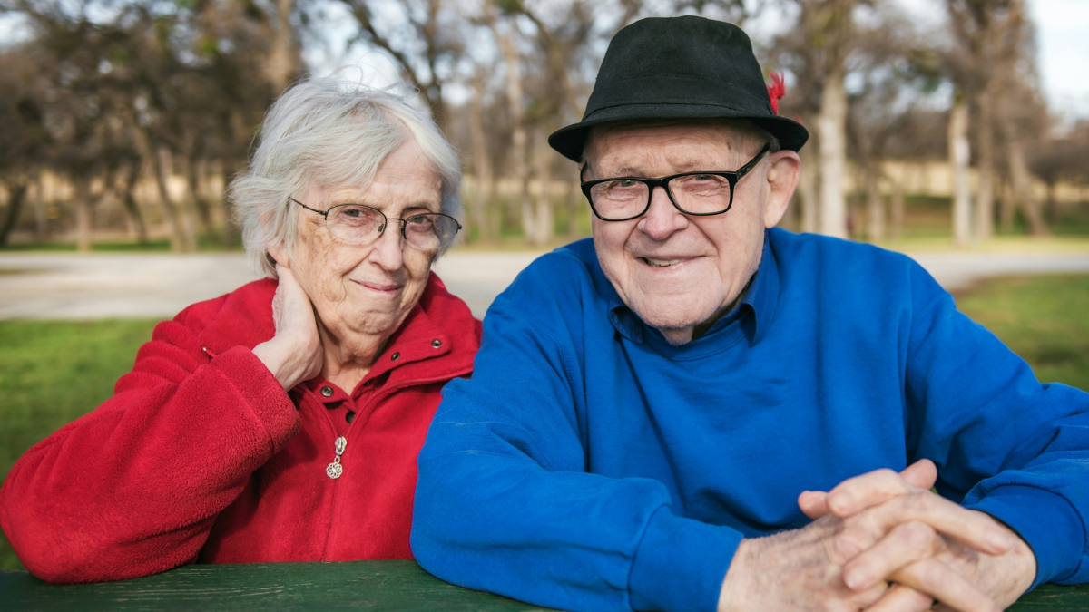 At what age can a wife take half of her husband's Social Security?