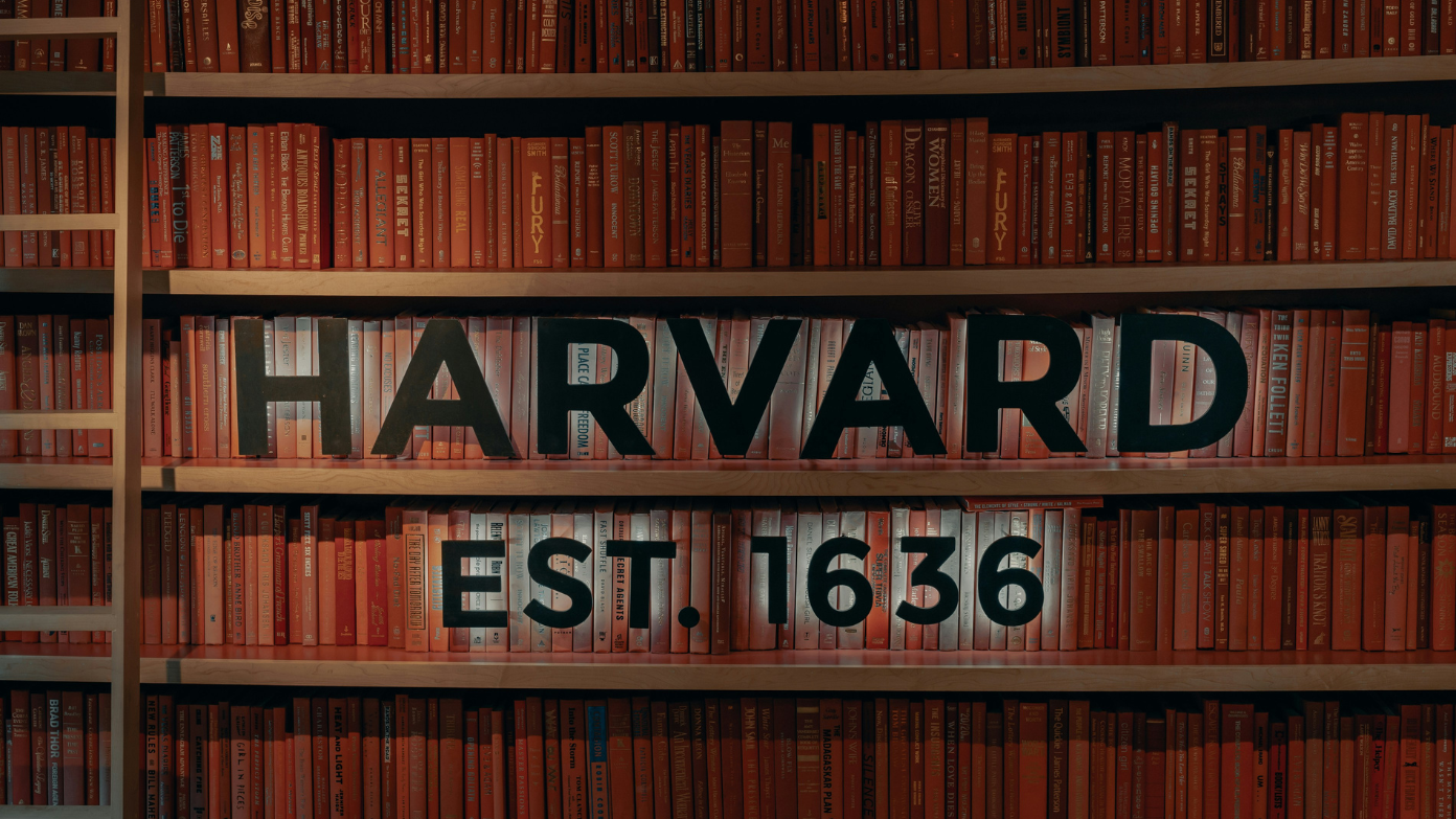 What is the new aid Harvard is offering for low and middle-income families