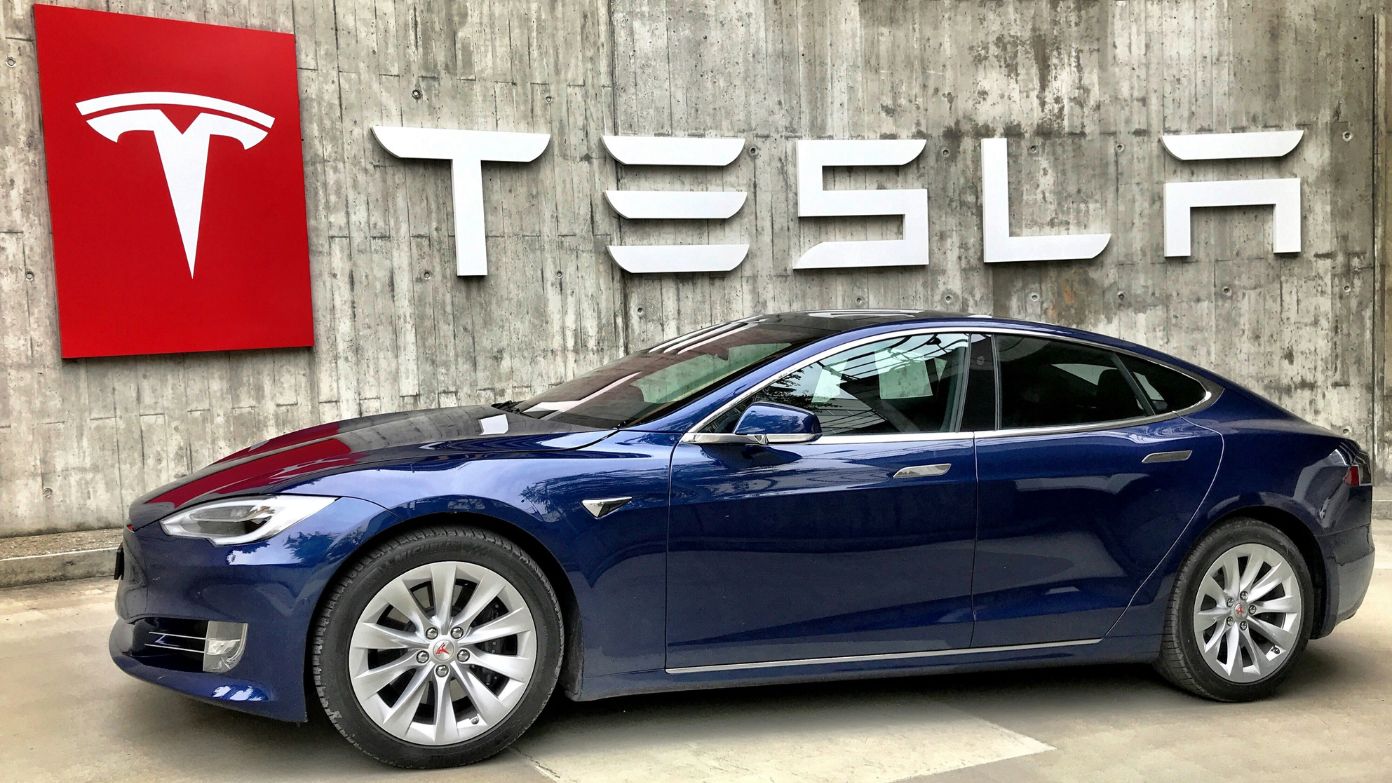 Many new Tesla buyers are discovering their vehicles sat outside for months before delivery — and they are not happy