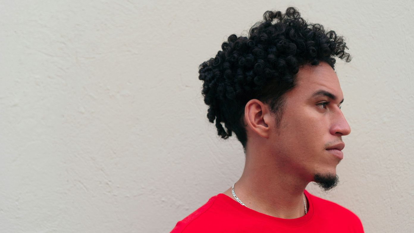The former employee says he was targeted for wearing his natural hair and is now taking legal action under California’s CROWN Act